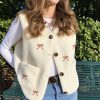 Gilet Berger écru avec broderie noeuds terracotta